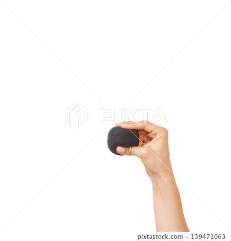 Person, hand and stress ball for anxiety, exercise or squeeze against a white studio background. Closeup of human palm with round object in anger management, relief or tension on mockup space Person, hand and stress ball for anxiety, exercise or squeeze against a white studio background. Closeup of human palm with round object in anger management, relief or tension on mockup space 139471063