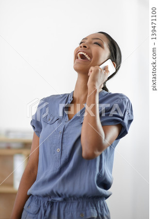 Woman, phone call and laugh in home for communication, mobile contact and digital conversation. Happy young african person talking on smartphone for social networking, funny news and comedy of joke Woman, phone call and laugh in home for communication, mobile contact and digital conversation. Happy young african person talking on smartphone for social networking, funny news and comedy of joke 139471100