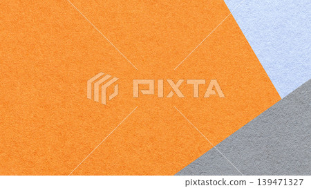 Orange textured paper background with light blue gray triangular corners and copy space. Template for presentation, banner Orange textured paper background with light blue gray triangular corners and copy space. Template for presentation, banner 139471327