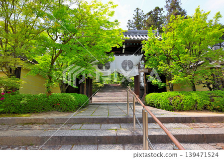 The main gate, overlooking the Omotesando (main approach) to Komyoji Temple, the head temple of the Nishiyama Jodo sect. The main gate, overlooking the Omotesando (main approach) to Komyoji Temple, the head temple of the Nishiyama Jodo sect. 139471524