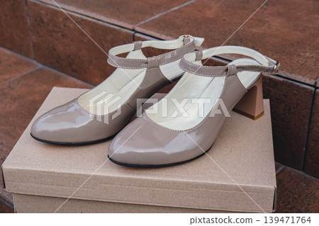 Elegant patent leather sandals high heels blank product for branding displayed. New casual female sandals no-brand footwear e-commerce. No logo product unbranded fashion footwear Elegant patent leather sandals high heels blank product for branding displayed. New casual female sandals no-brand footwear e-commerce. No logo product unbranded fashion footwear 139471764