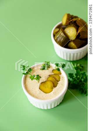 creamy tartar sauce with sliced gherkins and fresh herbs creamy tartar sauce with sliced gherkins and fresh herbs 139471961
