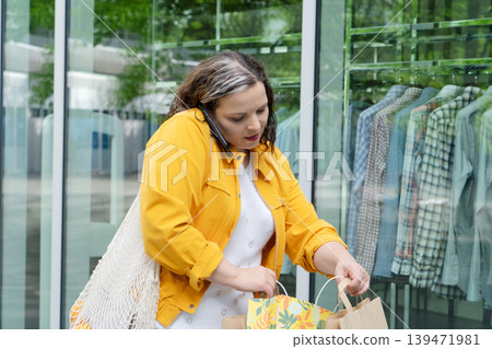 Happy woman shopping Happy woman shopping 139471981
