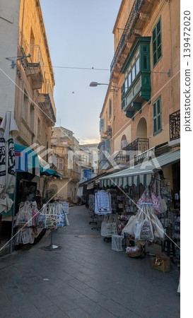 Street view of gift shops in tourist area in the evening Street view of gift shops in tourist area in the evening 139472020
