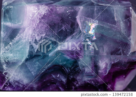 Macro mineral stone Fluorite crystal on a black background 139472158