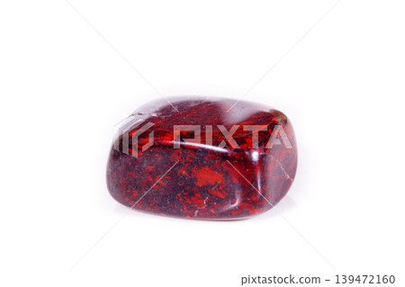 Macro mineral stone jasper hematite on white background Macro mineral stone jasper hematite on white background 139472160
