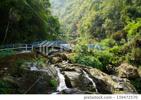 Iconic Landscape of Rock Garden Darjeeling with Terraced Waterfalls and Stone Architecture Iconic Landscape of Rock Garden Darjeeling with Terraced Waterfalls and Stone Architecture 139472570