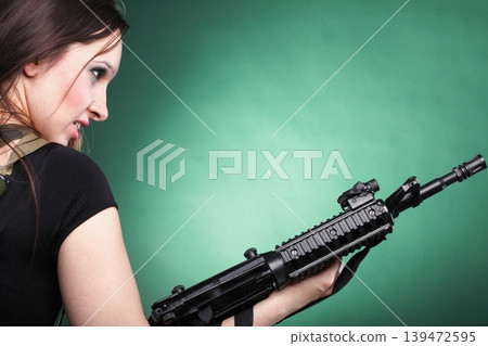 Army Woman With Gun - Beautiful woman with rifle plastic Army Woman With Gun - Beautiful woman with rifle plastic 139472595