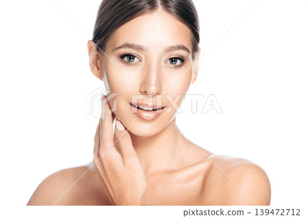 Portrait of young beautiful woman isolated on white. Natural beauty face with lift skin Portrait of young beautiful woman isolated on white. Natural beauty face with lift skin 139472712