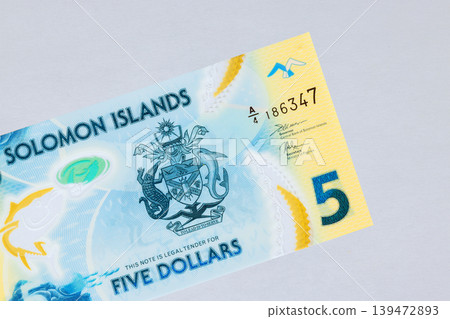 Solomon Islands five dollars polymer currency bill from 2019 issued Bank of Solomon Islands Solomon Islands five dollars polymer currency bill from 2019 issued Bank of Solomon Islands 139472893