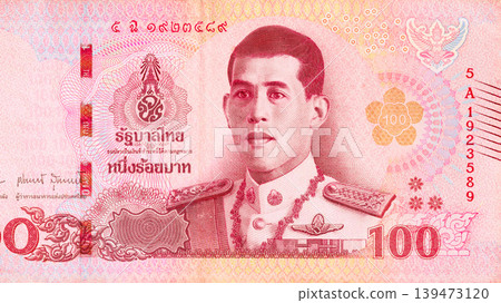 Official Thai currency 100 baht cash denomination paper money produced by Bank of Thailand front view Official Thai currency 100 baht cash denomination paper money produced by Bank of Thailand front view 139473120