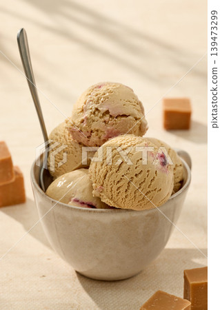 Caramel gelato ice cream in bowl Caramel gelato ice cream in bowl 139473299