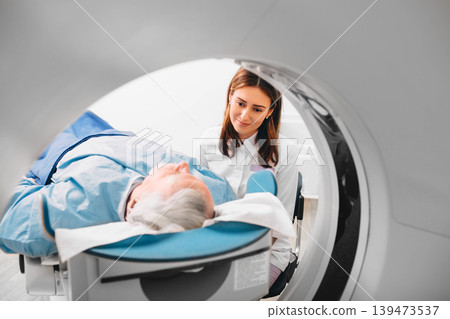 friendly doctor preparing elderly patient for CT Scan in hospital 139473537