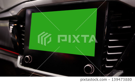 Screen or monitor in car mockup with green. Modern car interior with digital infotainment display and green screen mockup. Dashboard technology touchscreen navigation system. smart car interface tech Screen or monitor in car mockup with green. Modern car interior with digital infotainment display and green screen mockup. Dashboard technology touchscreen navigation system. smart car interface tech 139473880