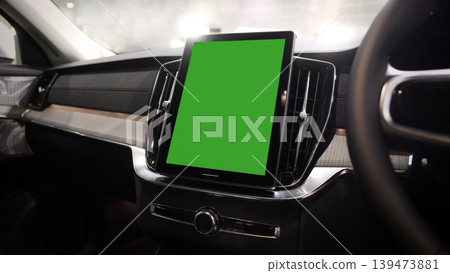 Screen or monitor in car mockup with green. Modern car interior with digital infotainment display and green screen mockup. Dashboard technology touchscreen navigation system. smart car interface tech Screen or monitor in car mockup with green. Modern car interior with digital infotainment display and green screen mockup. Dashboard technology touchscreen navigation system. smart car interface tech 139473881