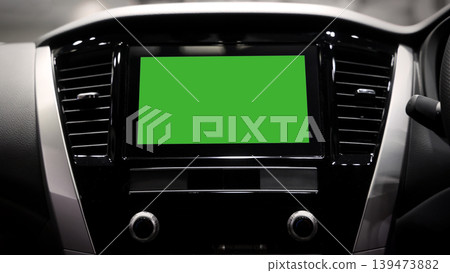 Screen or monitor in car mockup with green. Modern car interior with digital infotainment display and green screen mockup. Dashboard technology touchscreen navigation system. smart car interface tech Screen or monitor in car mockup with green. Modern car interior with digital infotainment display and green screen mockup. Dashboard technology touchscreen navigation system. smart car interface tech 139473882