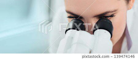 Scientist using microscope in lab, close-up. Laboratory technician while work 139474146