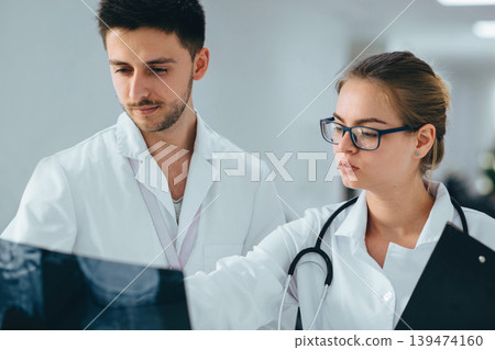 group of medical students practising at clinic group of medical students practising at clinic 139474160