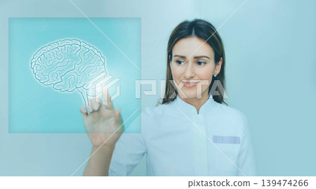 Woman scientist touching medical interface with brain Woman scientist touching medical interface with brain 139474266