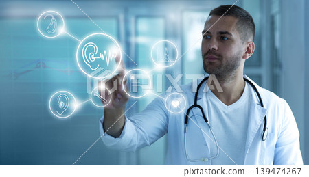 Digital hearing treatment concept. Doctor touching holographic screen with hearing icons. hearing exam and treatment 139474267