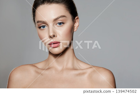 Beauty face concept, high quality. Beauty portrait of caucasian young woman with healthy moisturized facial skin and natural plump lips 139474502