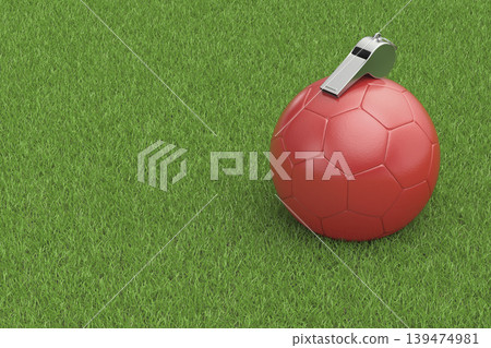 Football and metal referee whistle 139474981
