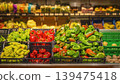 Vegetable farm market. Peppers fill market crates in grocery store, green and red produce on supermarket display for food, retail, cooking, nutrition. Fresh peppers, shopping, agriculture, harvest 139475418