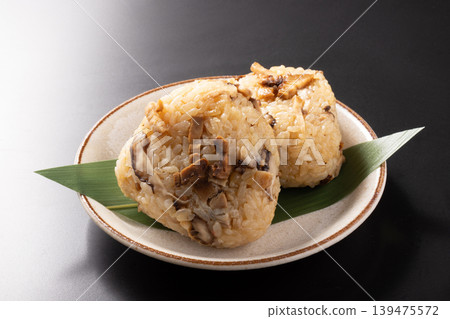Rice ball (with char siu pork, shiitake mushrooms, and seasoned rice) Rice ball (with char siu pork, shiitake mushrooms, and seasoned rice) 139475572