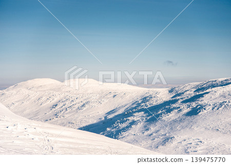 Landscape of snowy Sheregesh mountains, mountain range haze winter Bird eye view 139475770