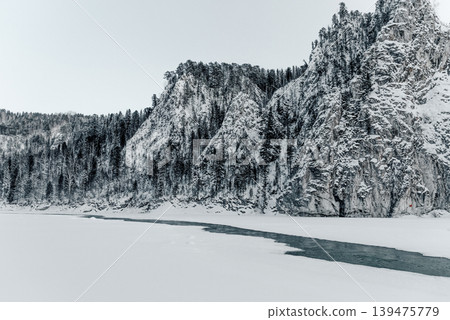 Landscape of Siberia mountains, mountain range in haze winter Landscape of Siberia mountains, mountain range in haze winter 139475779