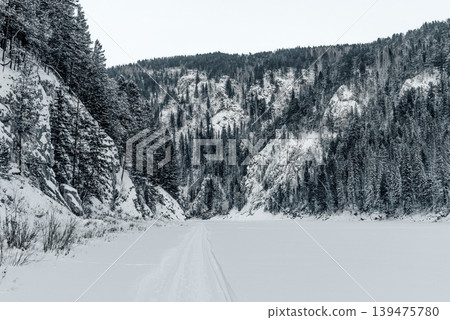 Landscape of Siberia mountains, mountain range in haze winter Landscape of Siberia mountains, mountain range in haze winter 139475780