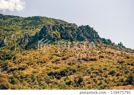Landscape of Crimea mountains, mountain range in haze summer Valley of Ghosts Landscape of Crimea mountains, mountain range in haze summer Valley of Ghosts 139475795