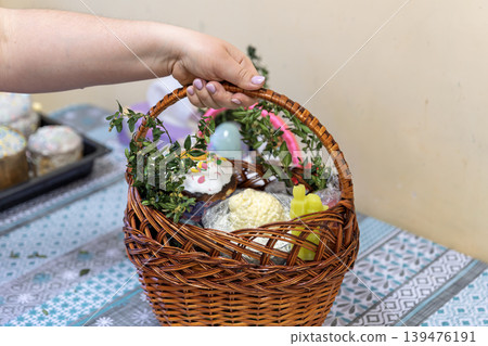 Woman Holding Traditional Ukrainian Easter Basket with Paska Woman Holding Traditional Ukrainian Easter Basket with Paska 139476191