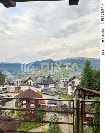 View of Bukovel Mountain Resort with Traditional Houses and Solar Panels View of Bukovel Mountain Resort with Traditional Houses and Solar Panels 139476249