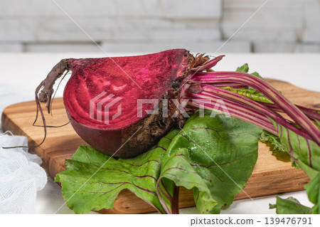 Organic beetroot vegetable / fresh red beet root harvested on wooden board Organic beetroot vegetable / fresh red beet root harvested on wooden board 139476791