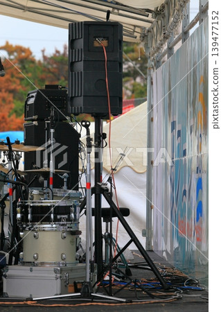 Drum set and PA equipment at the event venue Drum set and PA equipment at the event venue 139477152
