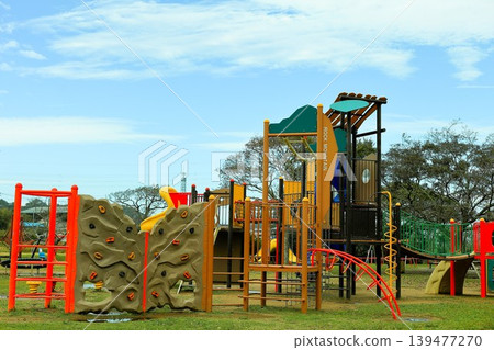 Athletic playground equipment in the park 139477270