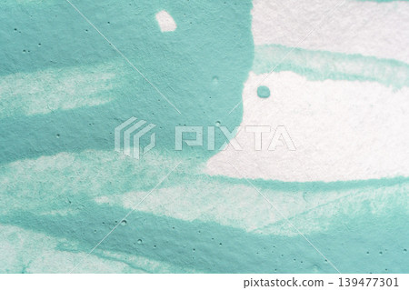 A paper background image showing varying shades of light blue watercolor. A paper background image showing varying shades of light blue watercolor. 139477301