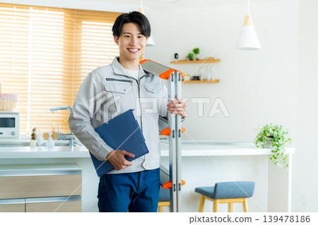 Businessman in work clothes inspecting 139478186