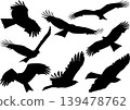 A set of silhouettes of birds gliding with their wings spread. 139478762