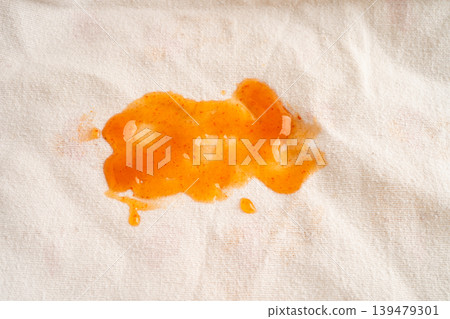 Dirty tomato sauce stain or ketchup on cloth. Dirty tomato sauce stain or ketchup on cloth. 139479301