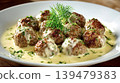 Swedish meatballs with creamy sauce and fresh dill 139479383