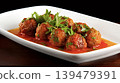Plateful of meatballs with tomato sauce and fresh parsley 139479391