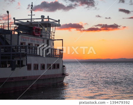 Sunset and ferry on Ometepe Island, Nicaragua Sunset and ferry on Ometepe Island, Nicaragua 139479392