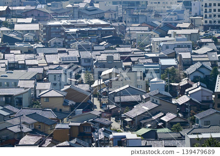 The streets of Kanazawa, gleaming with black roof tiles. The streets of Kanazawa, gleaming with black roof tiles. 139479689