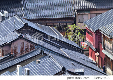 The streets of Kanazawa, gleaming with black roof tiles. The streets of Kanazawa, gleaming with black roof tiles. 139479690