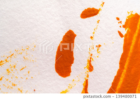 Paper texture showing the fading of orange watercolor paint. Paper texture showing the fading of orange watercolor paint. 139480071