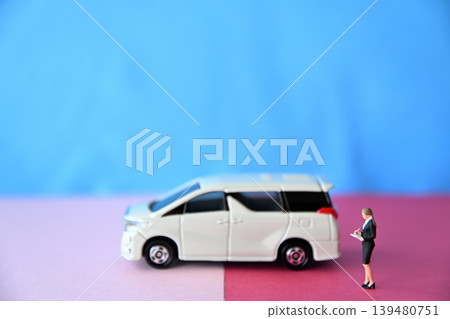 Image of a female car appraiser. Image of a female car appraiser. 139480751