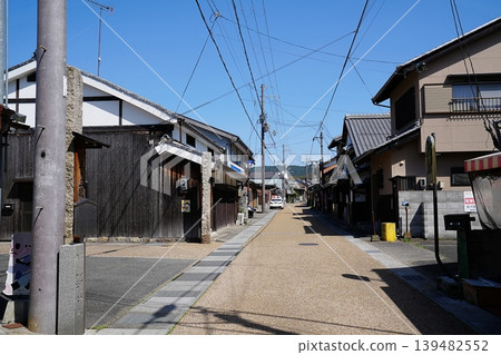 Shiga Prefecture, Koka City, Tokaido Road, Tsuchiyama-juku, old highway townscape (eastward from near the post station) (Spring) Shiga Prefecture, Koka City, Tokaido Road, Tsuchiyama-juku, old highway townscape (eastward from near the post station) (Spring) 139482552