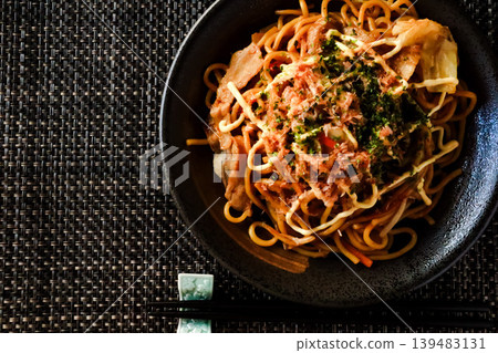 Yakisoba served on a black plate Yakisoba served on a black plate 139483131